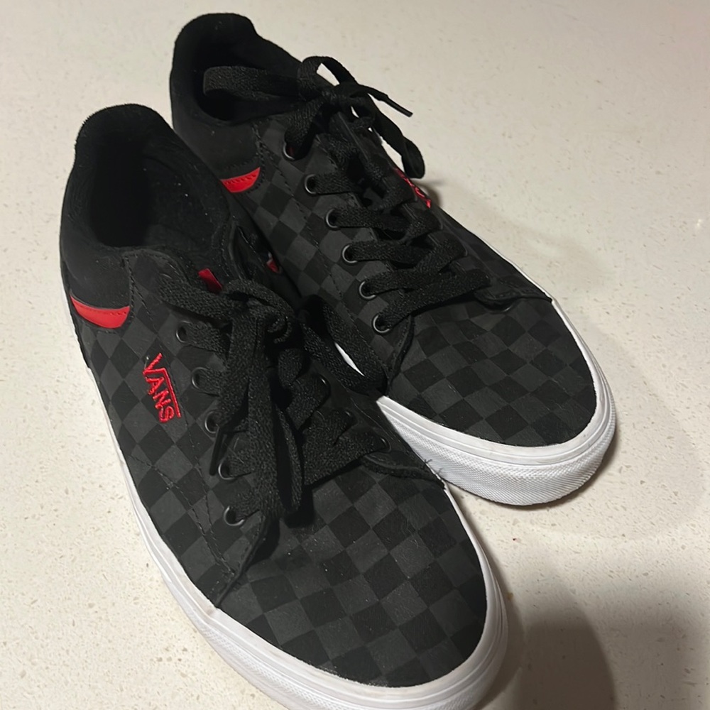 Vans Black and red tennis shoes. Size 9. Worn only a few times